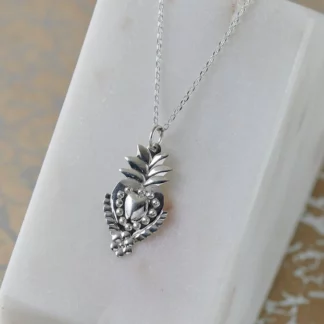 Pendentif argent coeur fleuri () - Tienda Esquipulas