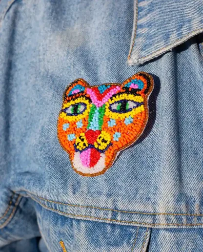 Broche jaguar orange () - Tienda Esquipulas