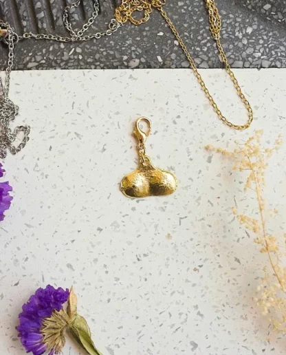 Charm milagrito bust () - Tienda Esquipulas
