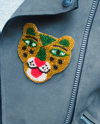 Gold jaguar brooch